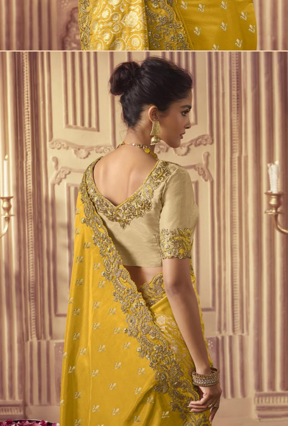yellow saree with gold blouse