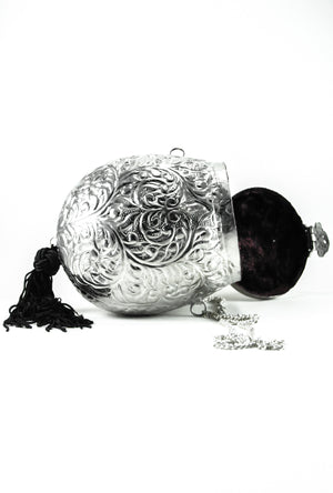 Silver Oval metal Clutch with Black Tassles - Desi Royale