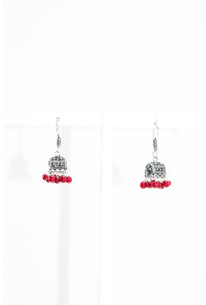 Black metal earrings with red beads - Desi Royale