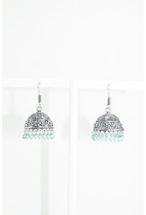 Black metal earrings with blue beads - Desi Royale
