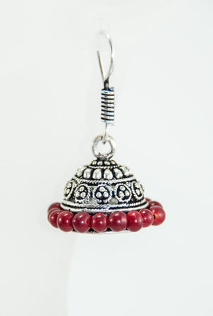 Black metal earrings with red beads - Desi Royale